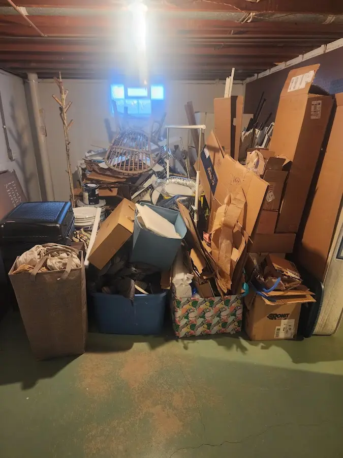 Roll-off dumpster container at job site for 8 Yard Dumpster Rental in Bagdad